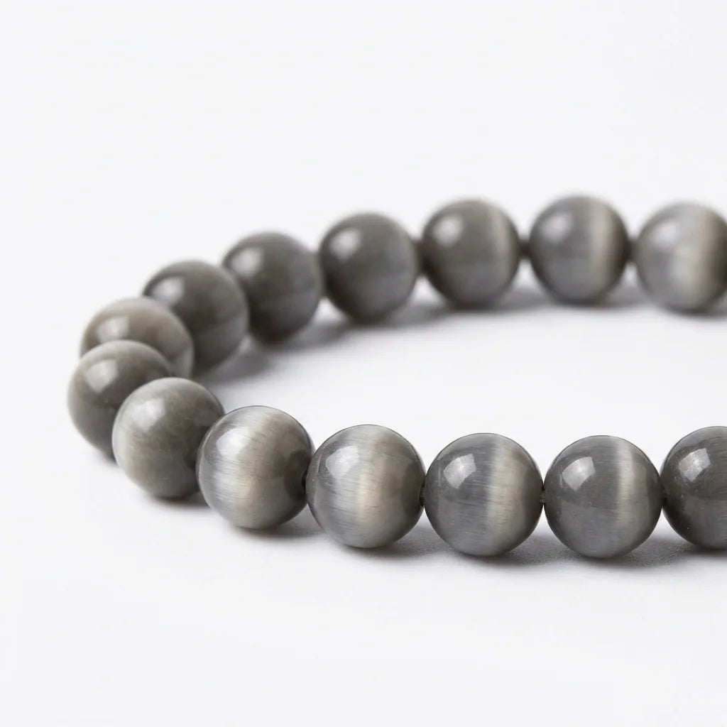 Grey cat's eye stone bracelet macro chatoyant shimmer